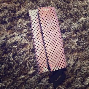 Pink clutch, handbag.